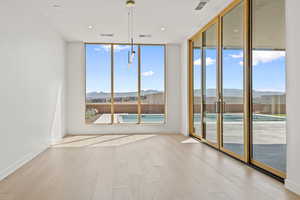 Dining Area with Large Windows and Sliders