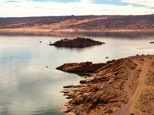 Sand Hollow Reservoir is Just Right Down the Road! Boat, Paddle Board, Cliff Jump, Scuba Dive, Lounge on the Beach!