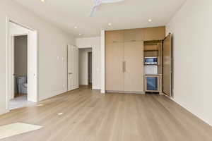 Custom Cabinetry with Fridge and Microwave in Flex/Bedroom 2