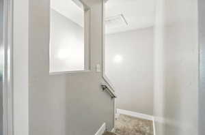 Stairs featuring baseboards