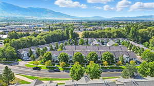 Aerial view of residential area with a mountainous background