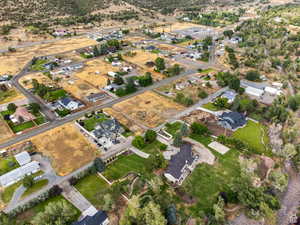 Aerial overview of property's location with nearby suburban area