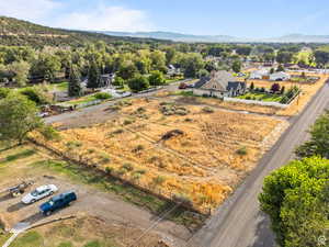 Aerial view of residential area with a mountain backdrop