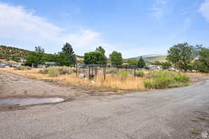 View of street with a mountain view and a view of countryside