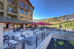 Surrounding community featuring a patio area and a mountain view