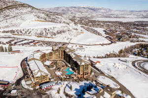 Snowy aerial view with a mountain view