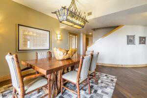 Dining space featuring baseboards and wood finished floors