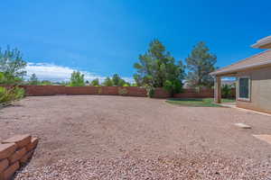 View of fenced backyard