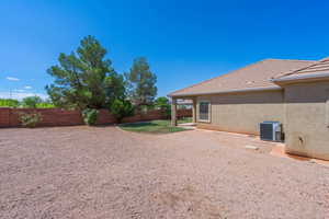 View of fenced backyard
