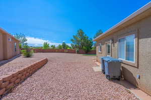 View of fenced backyard