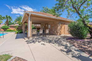 View of property's community with a pool