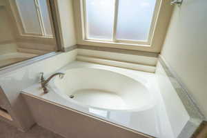 Bathroom featuring a garden tub