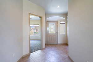 Foyer featuring baseboards