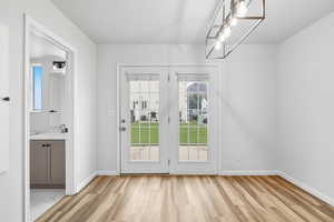 French doors leading out on first level to patio, and a half bath