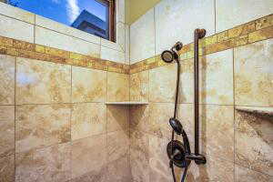 Bathroom view of tiled shower