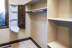 Walk in closet featuring light tile patterned floors