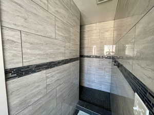 Bathroom featuring a shower stall
