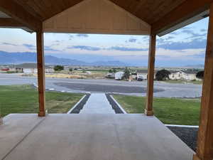 View of patio / terrace featuring a mountain view