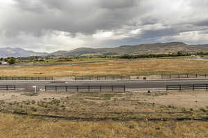 View of mountain background featuring rural landscape