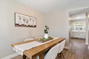 Dining room featuring dark wood finished floors
