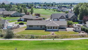Aerial perspective of suburban area with a golf course