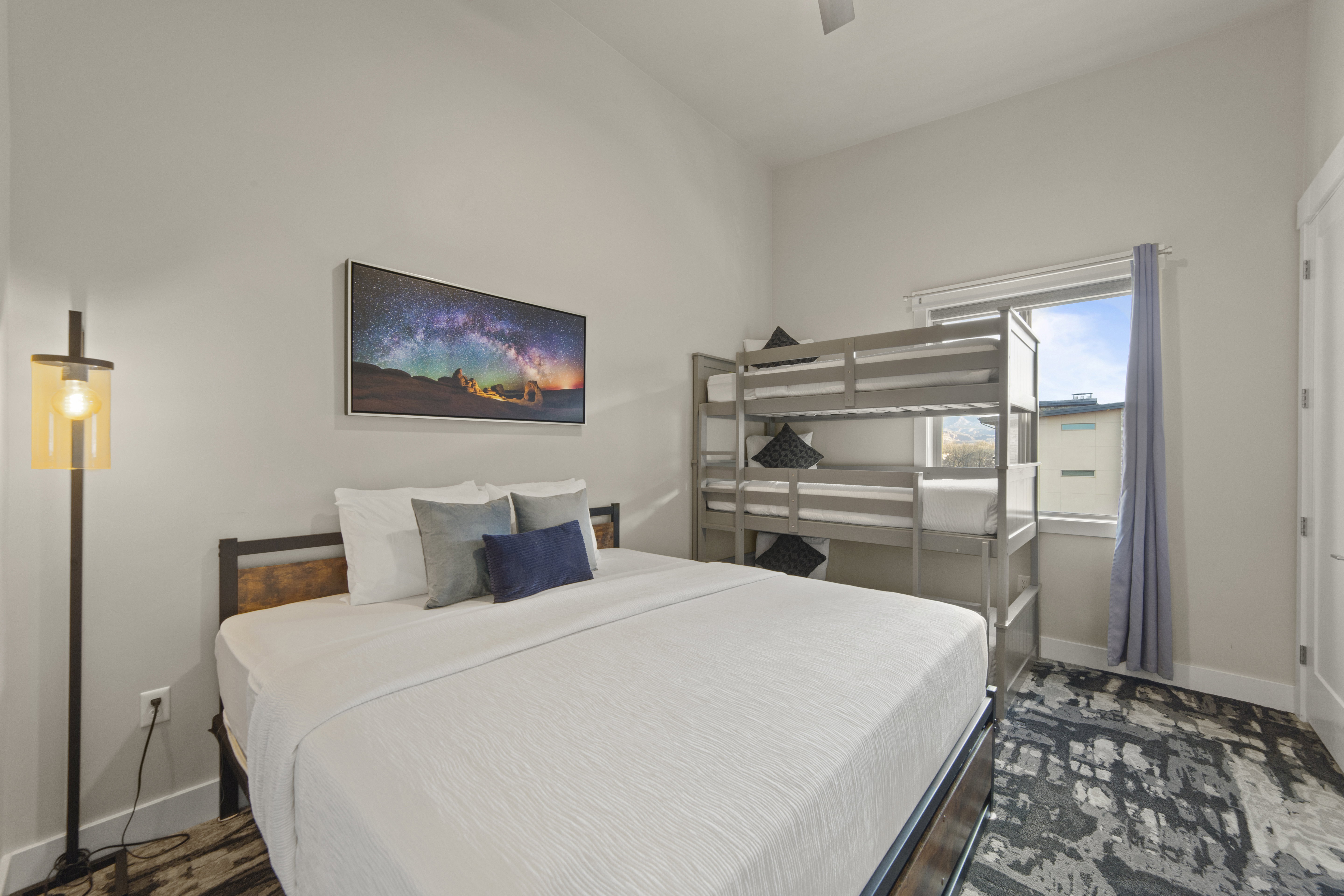 Bedroom featuring ceiling fan and baseboards