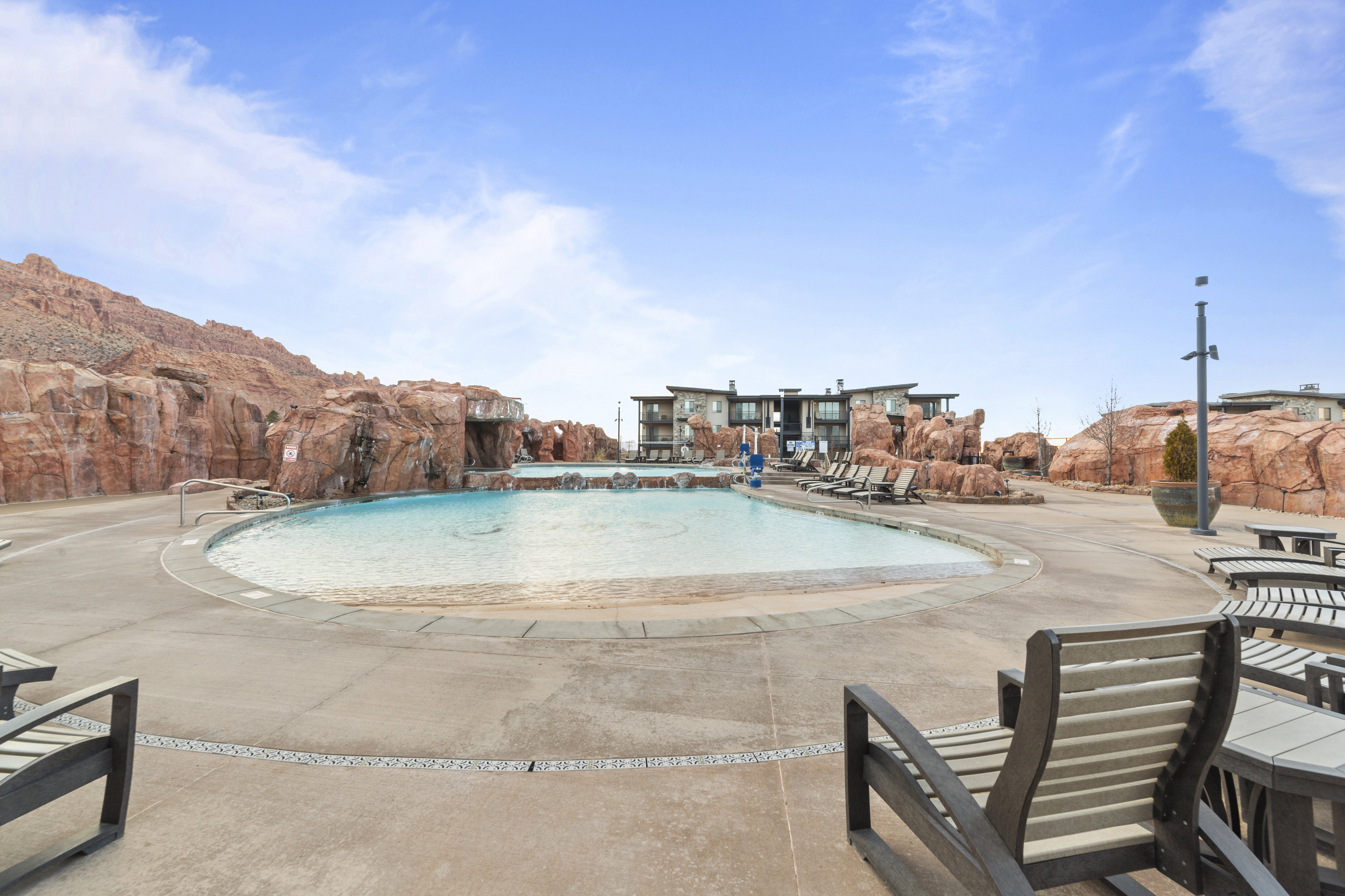 Community pool featuring a patio area