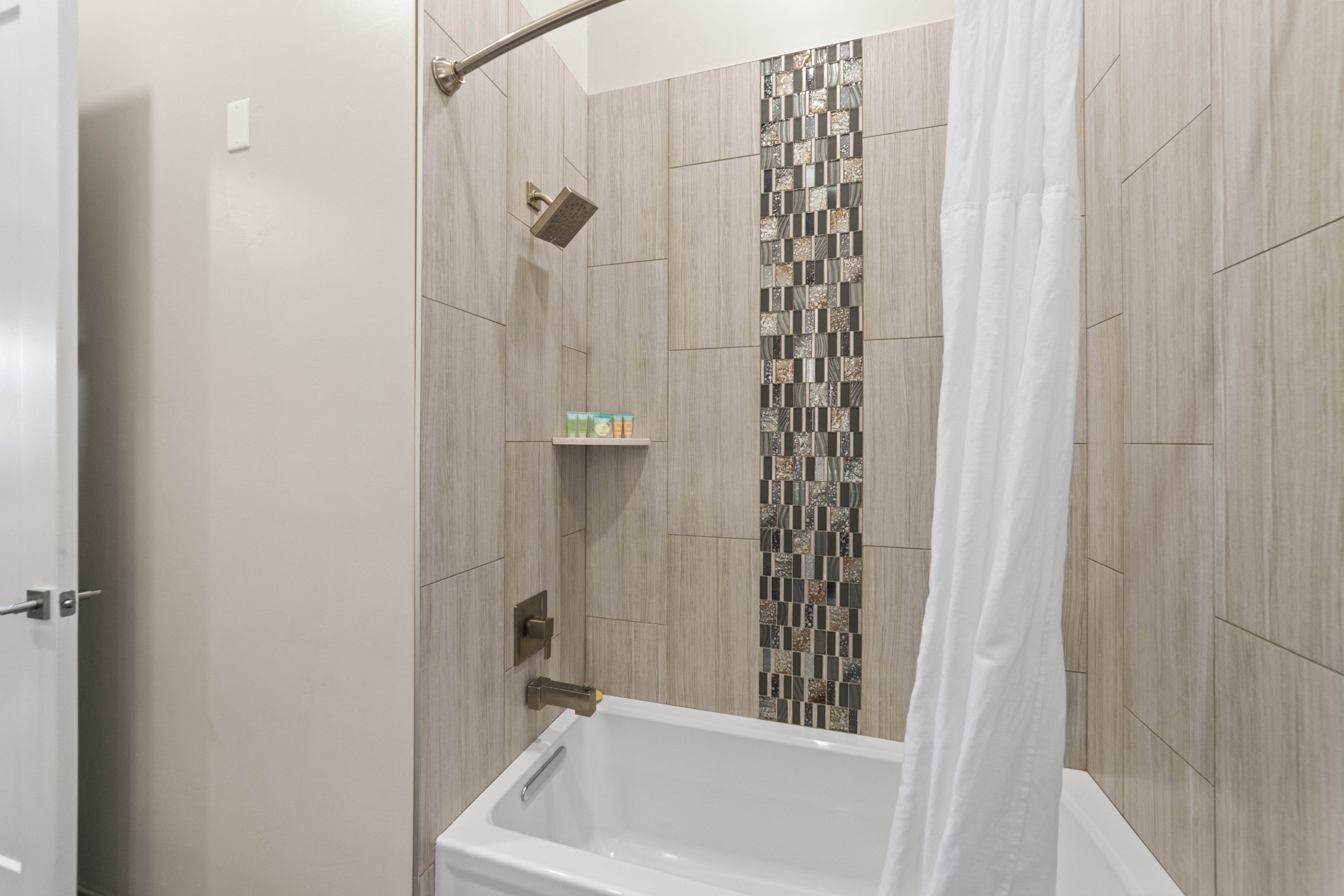 Bathroom featuring shower / bath combo