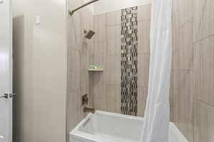 Bathroom featuring shower / bath combo