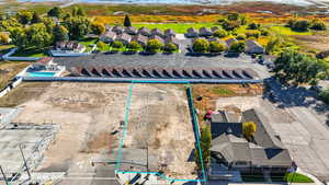 Aerial view of residential area featuring property parcel outlined