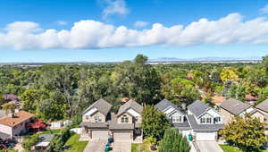 Aerial view of residential area with mountains