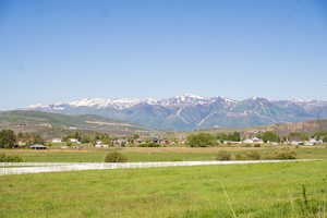Property view of mountains with a rural view