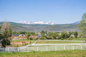 View of mountain feature with a rural view