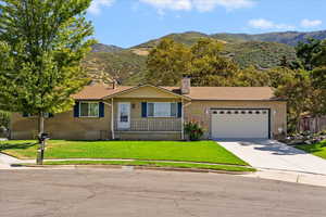 Ranch-style home featuring a mountain view
