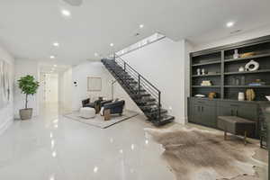 Interior space with recessed lighting and stairs