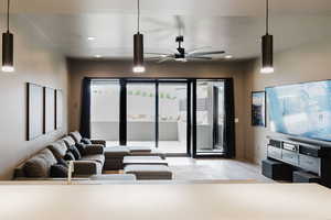 Living room featuring ceiling fan, recessed lighting, and light wood-style flooring