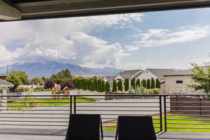 Balcony with a residential view and a mountain view