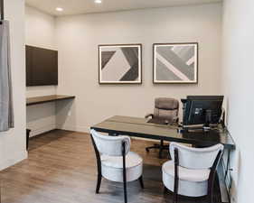 Office featuring light wood-style flooring and recessed lighting