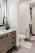 Bathroom with vanity and toilet