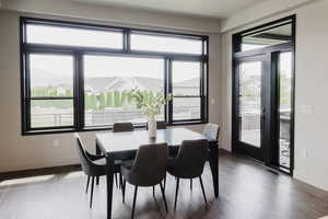 Dining area featuring wood finished floors and baseboards