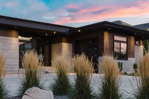 Property entrance with stone siding