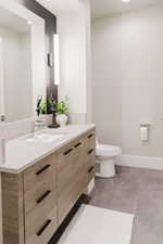 Half bath with vanity and recessed lighting