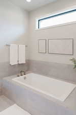 Bathroom featuring a bath