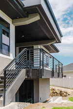 Entrance to property featuring stucco siding