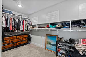 Walk in closet featuring carpet