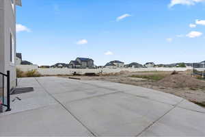 View of patio / terrace with a trampoline and a residential view