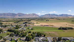 Overview of rural landscape featuring mountains