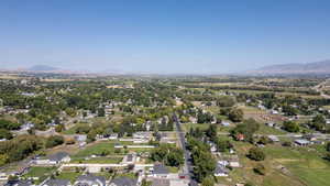 Aerial view of residential area featuring a mountain backdrop