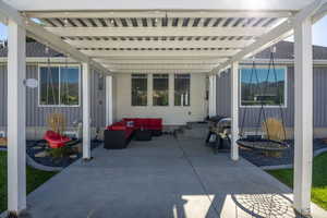 View of patio / terrace featuring an outdoor hangout area, a pergola, grilling area, and entry steps