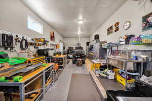 Garage featuring a workshop area
